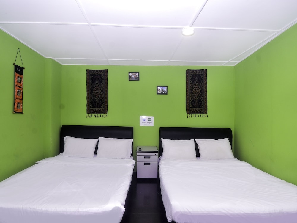 Spot On 89929 Tropical Lodge