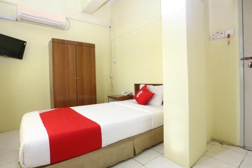 Harmoni Hotel by OYO Rooms